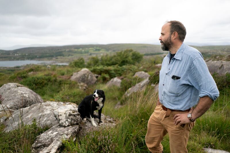 Daltun with his dog, Charlie, on his property. Photograph: Chris Maddaloni/The Irish Times
