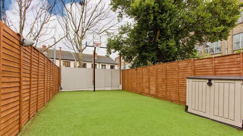 The rear garden at 294 South Circular Road, Dublin 8 is laid out with artificial grass.