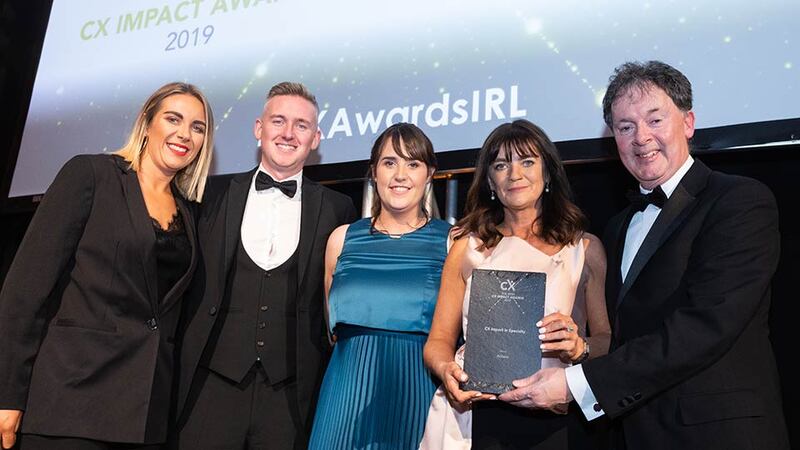 Gerard O'Neill, Awards Judge & Amárach Research presents the CX Impact in Speciality award to the Actavo team.