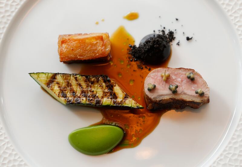 Lamb, artichoke, courgette and black garlic at Delahunt. Photograph: Alan Betson