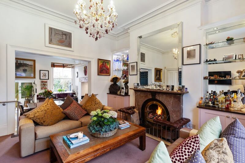 Livingroom with steps down to kitchen