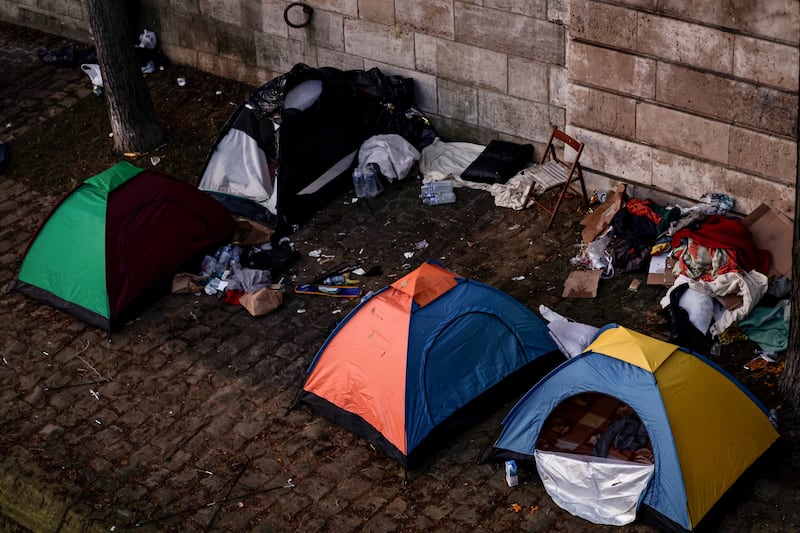 Tents are seen along the Seine on Friday. Photograph: Stephane de Sakutin/Getty