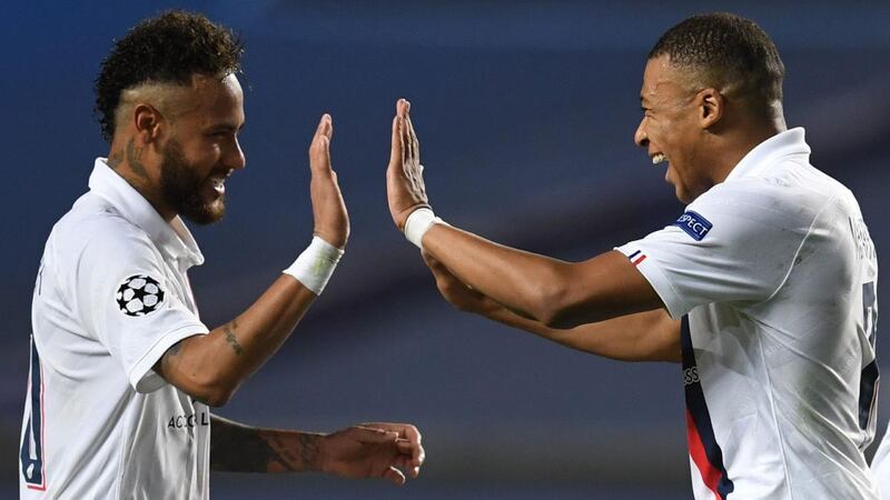 Paris Saint-Germain forwards  Neymar  and Kylian Mbappe celebrate the win over Atalanta in the Champions League quarter-finals. Photograph:  David Ramos/AFP via Getty Images