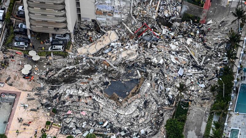 A memorial honoring the victims of an apartment building collapse nearly three weeks ago in the Florida beachfront community of Surfside may be built on the site of the disaster, officials said. Photograph: Chandan Khanna/AFP/ Getty Images