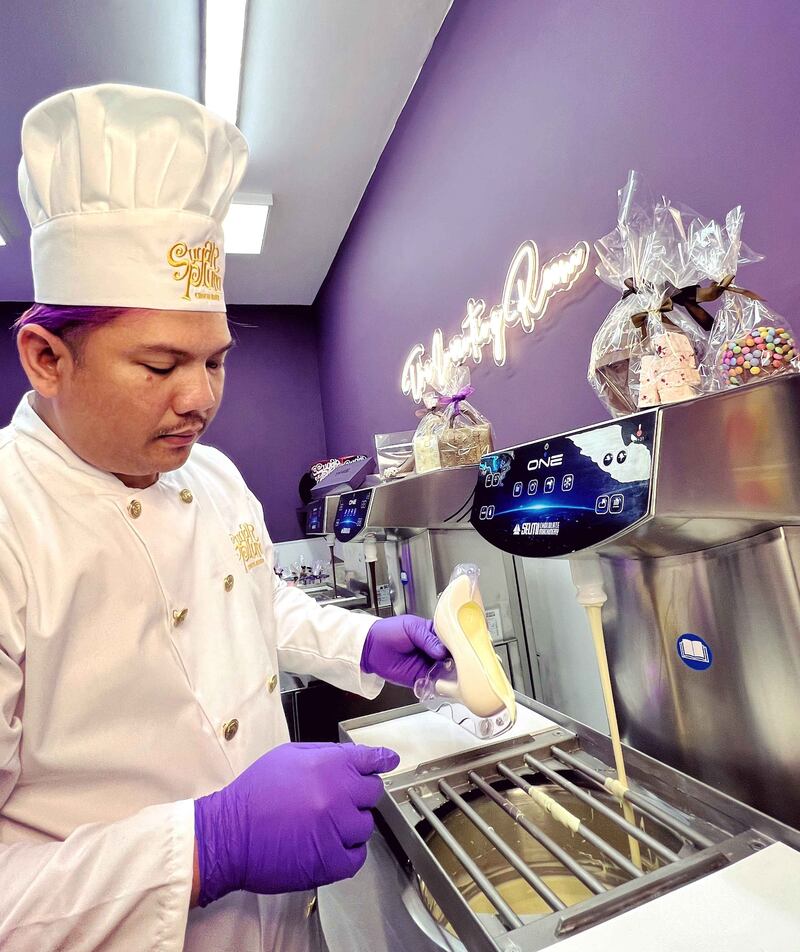 Chocolatier at work in Sugar Plum Sweetery kitchen