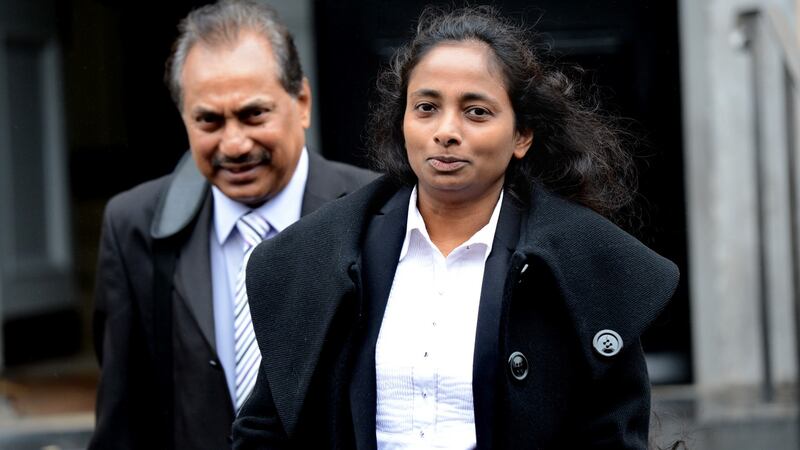 Christopher Marianayagam’s daughter Ingrid Francis leaving the inquest with her husband Terrence Francis. Photograph: Cyril Byrne/The Irish Times