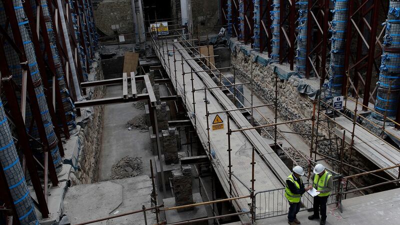 Workmen inside St Mel’s Cathedral in Longford during restoration works in 2012, nearly three years after the devastating fire. File photograph: Julien Behal/PA Wire