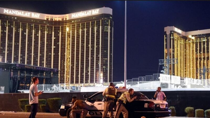 Las Vegas police stand guard along the streets outside the festival grounds of the Route 91 Harvest in Las Vegas, Nevada amid reports of an active shooter around the Mandalay Bay Resort and Casino. Photograph: David Becker/Getty Images