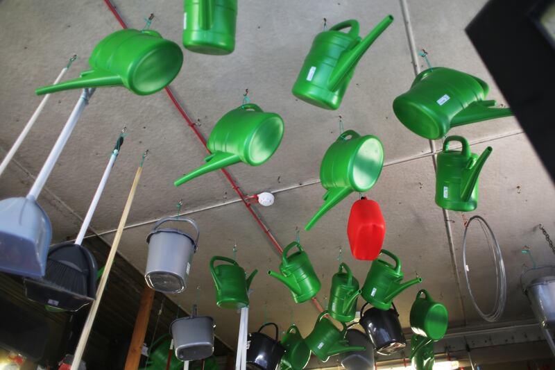 Watering cans hang from the ceiling of Edge & Sons Hardware Store, Fairview, Dublin. Photo: Bryan O'Brien