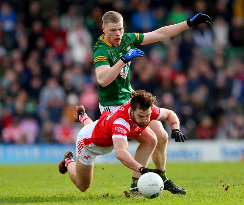 Meath’s Mathew Costello and Dermot Campbell of Louth. Photograph: James Crombie/Inpho