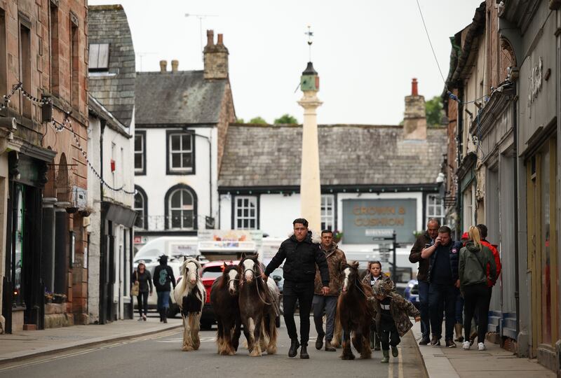 Appleby fair: Horses are walked through the town centre. Photograph: Adam Vaughan/EPA