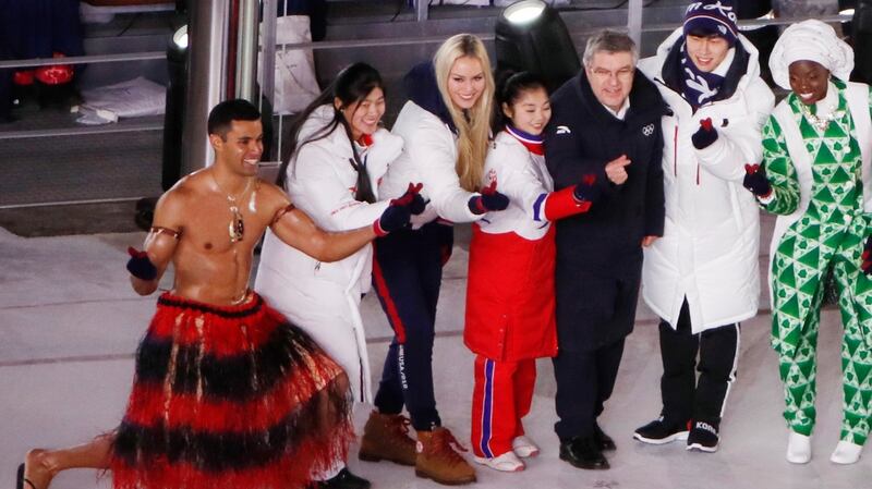 Ivanka Trump Thomas Bac pose with athletes from Tonga and Nigeria during the closing ceremony. Photo: Christian Hartmann/Reuters