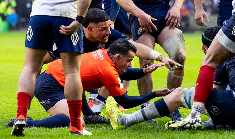 Referee Nic Berry checks to see if Sam Skinner's try has been grounded during the Six Nations match between Scotland and France at Murrayfield in February. Photograph: Ross Parker/Getty Images
