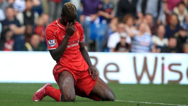 Liverpool’s Mario Balotelli after missing an effort on an open goal at Loftus Road. Photograph: Nick Potts/PA Wire
