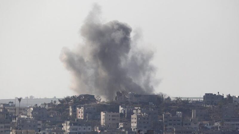 Smoke rises following what witnesses said was an Israeli air strike in Gaza today. Photograph: Ahmed Zakot/Reuters.