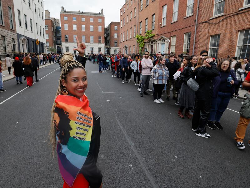 Brazilians line up in queues on North Great Georges street to cast their votes. Photograph: Alan Betson

