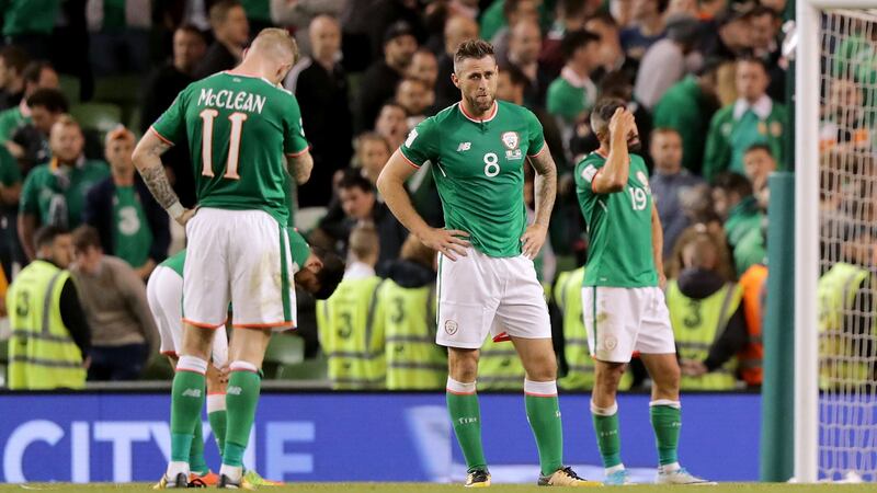 Ireland’s James McClean, Daryl Murphy and Jon Walters after the final whistle of their 1-0 defeat to Serbia at the Aviva Stadium. Photograph: Morgan Treacy/Inpho