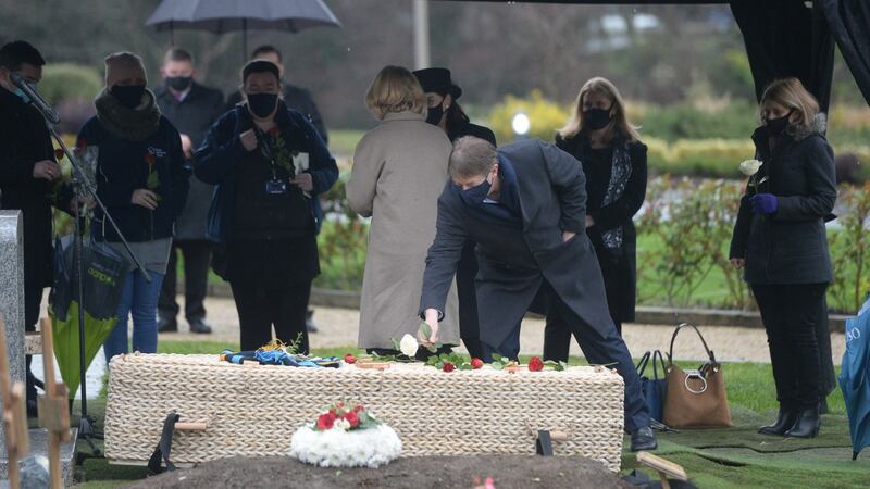 Mourners are seen at the funeral of Michael Byrne on Wednesday. Photograph: Dara Mac Donaill/The Irish Times.