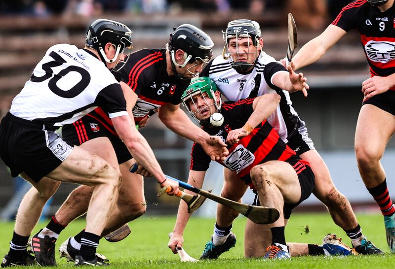 Ballygunner's Philip Mahony challenges for the ball ahead of Jerome Cahill and Sean McAdams of Kilruane MacDonaghs in their senior hurling club quarter-final in Walsh Park, Co Waterford. Photograph: Tom Maher/Inpho