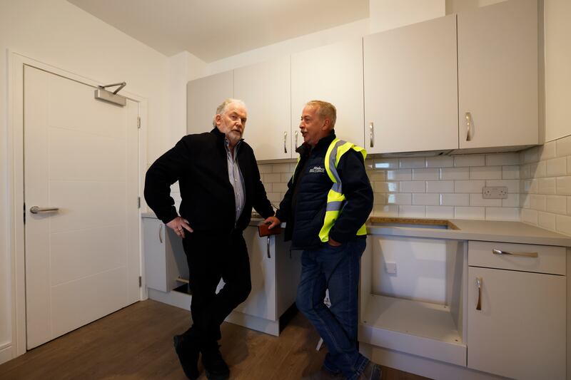 Tony O’Brien, chair of the Peter McVerry Trust and Dominic Nolan, project manager, at a new housing refurbishment project on Townsend Street.   Photograph: Nick Bradshaw