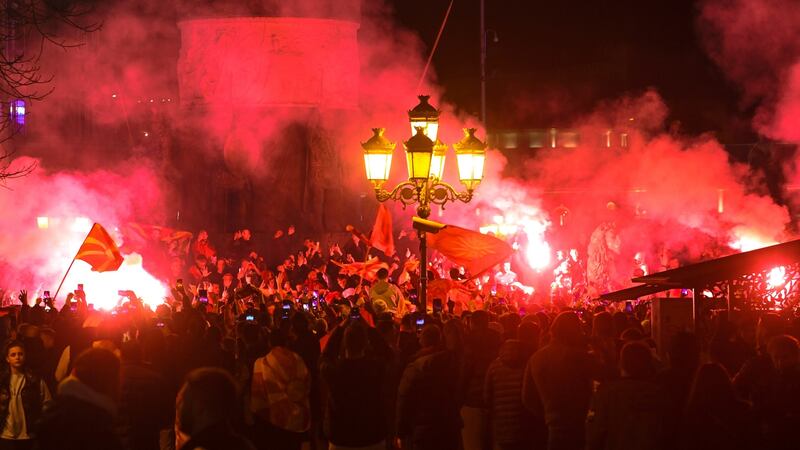 Locals in Skopje celebrate North Macedonia’s win over Italy on Thursday night. Photograph: EPA