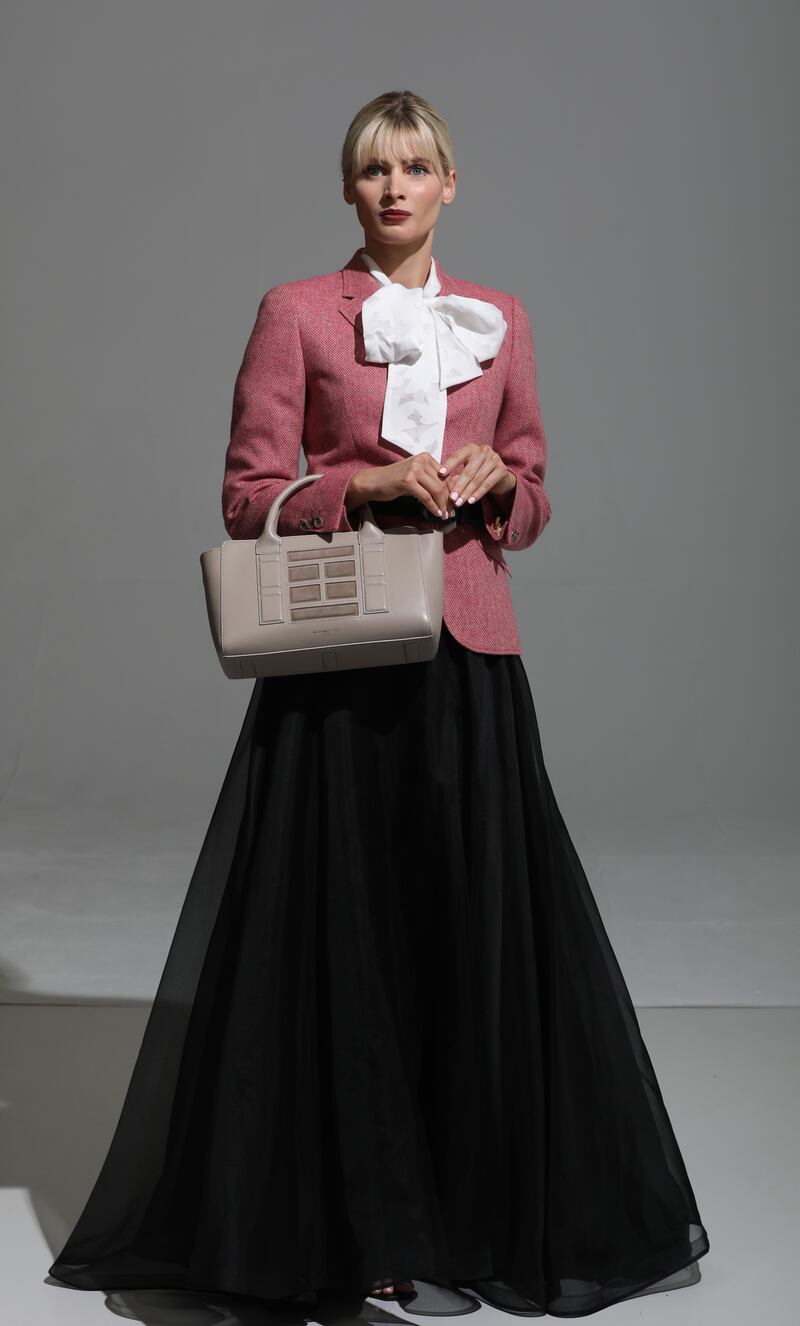 Fuschia pink wool herringbone Milly blazer from Magee (€299). Flower top (€325) and Annabelle silk organza skirt (€650), both from andtate.com. My Name is Ted arrow belt (€249)