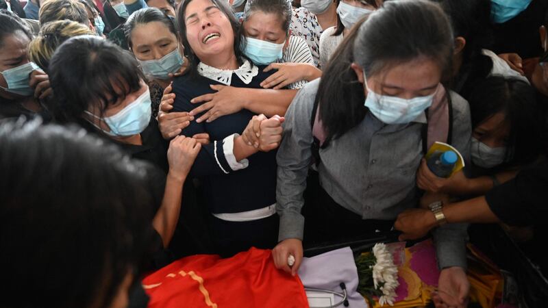 A woman mourns her son, who was shot dead during a crackdown last March, in Yangon. Photograph: AFP via Getty Images