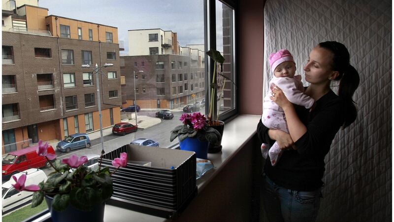 Priory Hall resident Katarzyna Bielecka with her daughter Liliana (2 months) in October 2011, after she and the other residents were handed eviction notices due to health and safety violations at the complex. Photograph: Brenda Fitzsimons