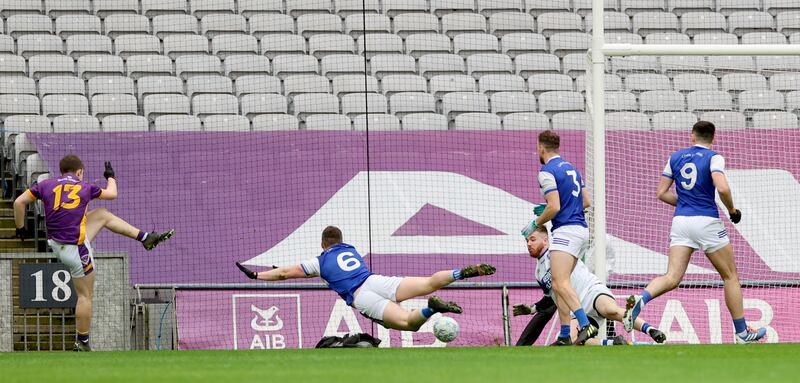 Kilmacud Crokes’ Hugh Kenny scores a goal despite the close attention of Karl Mullins, Ross O'Callaghan, goalkeeper Shane Foley and Tom Hoare of Kerins O' Rahillys. Photograph: James Crombie/Inpho