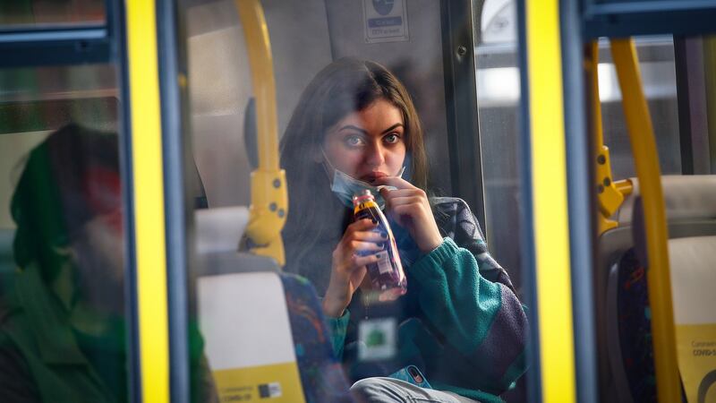 Signs on buses recommend the wearing of maks to anyone over 13. Photograph: Crispin Rodwell/ The Irish Times