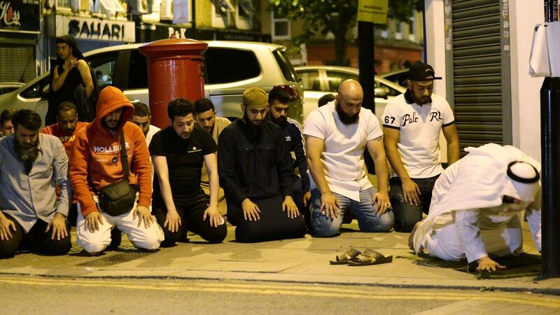 Local people observing prayers at Finsbury Park in north London on June 19th, 2017, shortly after the terror attack. Photograph:   Yui Mok/PA Wire