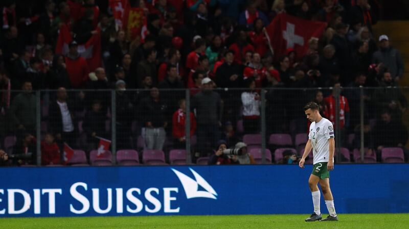 Seamus Coleman leaves the field after receiving a red card.
