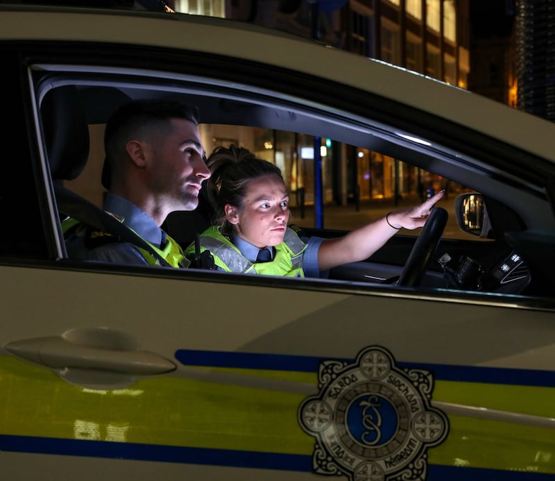 Garda Darren Reynolds and Garda Chloe Rochfort on patrol on Grafton Street. Photograph: Crispin Rodwell