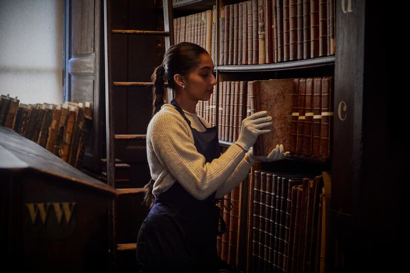 Trinity College Dublin: 200,000 volumes have been cleaned and tagged over the past 18 months. Photograph: Barry McCall 