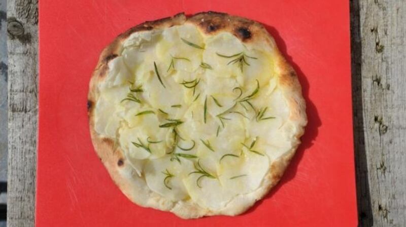 Pizza bianca with potato and rosemary.