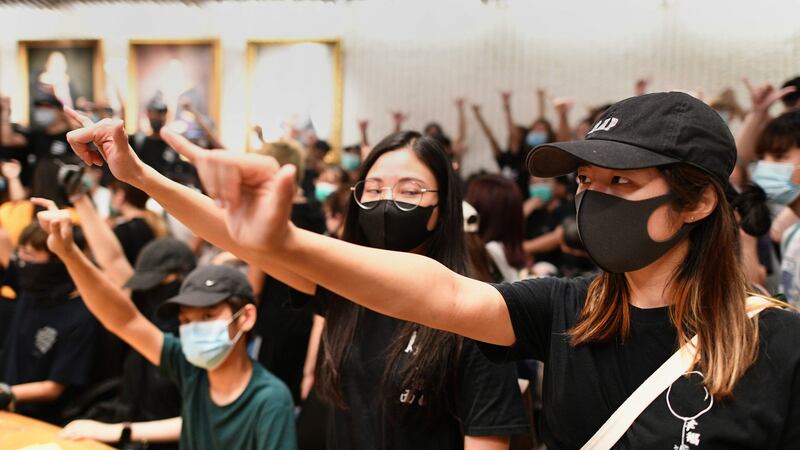 Student protesters in a meeting room after forcing their way into the administrative offices at the Chinese University of Hong Kong on Thursday. Photograph: Mohd Rasfan/AFP via Getty Images