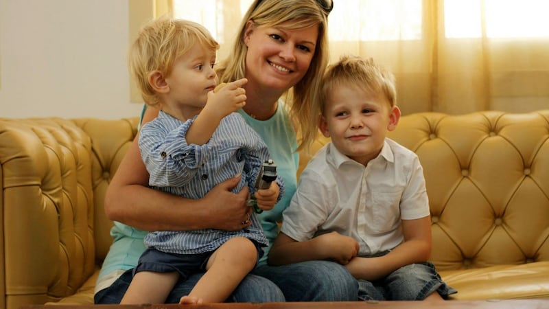 Gaelscoil UAE cofounder Esmé Halpenny with sons Dylan and Callum