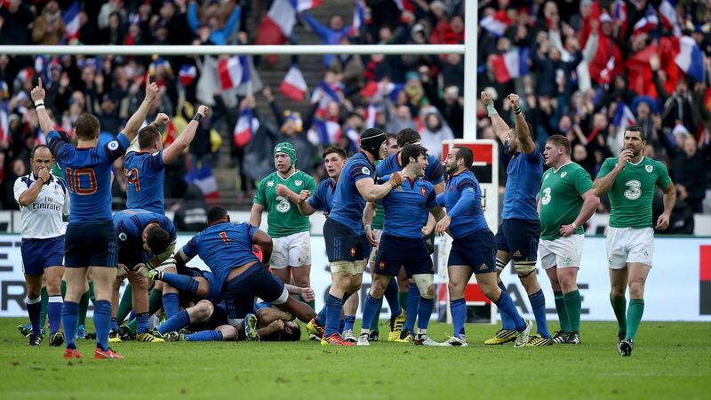 French players celebrate at the final whistle.