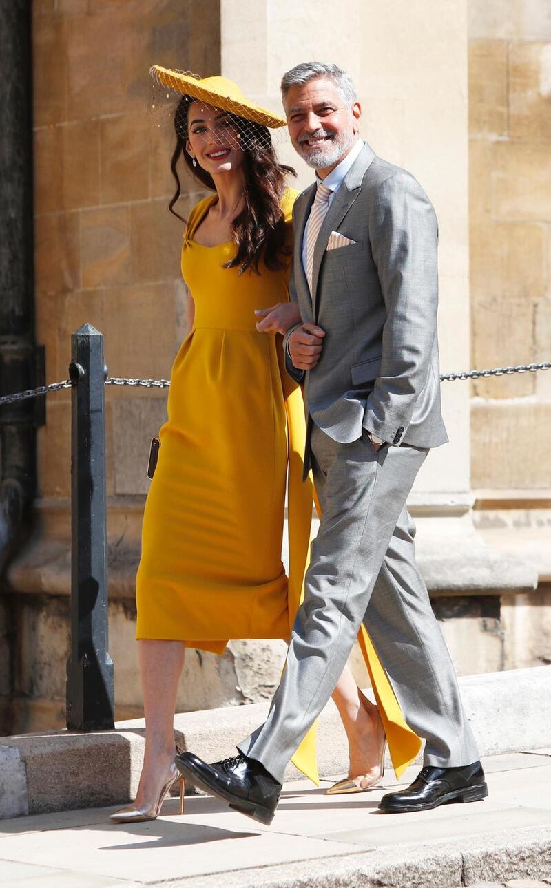 US actor George Clooney and his wife British lawyer Amal Clooney  arrive for the wedding ceremony of Britain’s Prince Harry, Duke of Sussex and US actress Meghan Markle in May. Photograph:   Alastair Grant /AFP