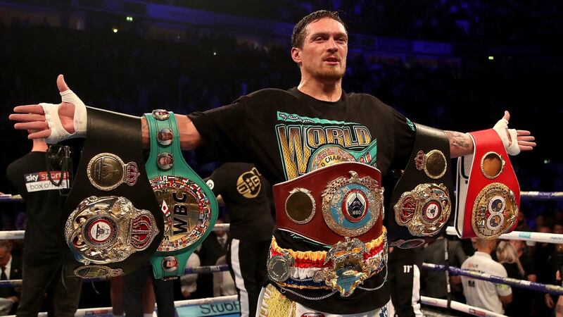 Oleksandr Usyk with his WBC, WBA, IBF, WBO & Ring Magazine cruiserweight belts. Photograph: Nick Potts/PA