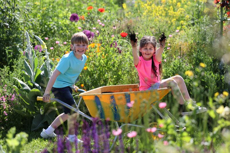 Robert Brady (7) from Clontarf and Medow Neville (7) from Ringsend at the new World of Soil visitor experience at Airfield Estate. Photograph: Nick Bradshaw
