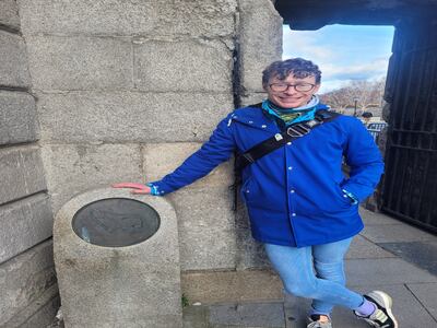 Karl Deery, Dublin walking tour guide,  with one of the medieval city markers along his popular stroll through the capital.