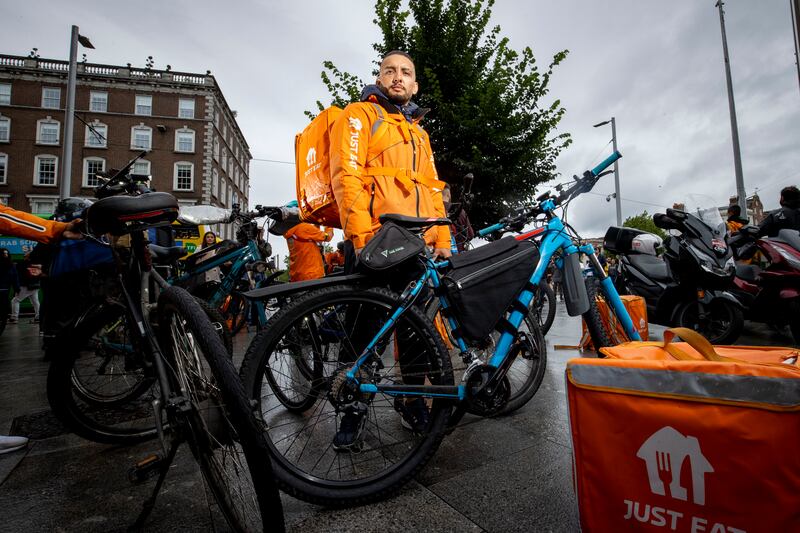Italo Roberto, from Brazil, delivering for Just Eats, at a protest by delivery riders to highlight low pay and safety concerns, on O’Connell Street, Dublin, July 2023. Photograph: Tom Honan 
