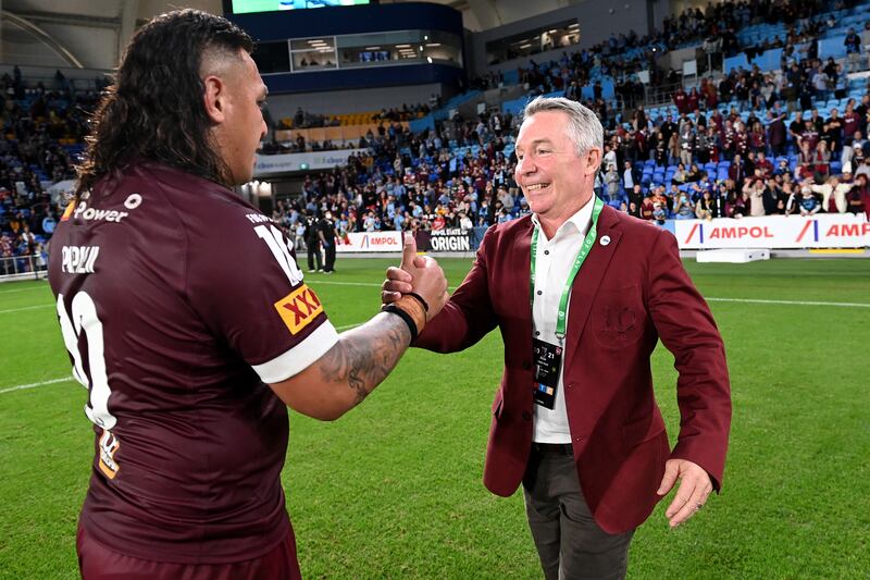  Maroons coach Paul Green celebrates with Josh Papalii after winning game three of the 2021 State of Origin Series between the New South Wales Blues and the Queensland Maroons at Cbus Super Stadium in July 2021 in Gold Coast, Australia. Photograph:  Bradley Kanaris/Getty Images