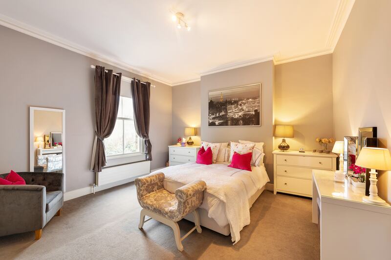 Four bedrooms are spread over two floors upstairs, the principal of which takes up the entire width of the property.