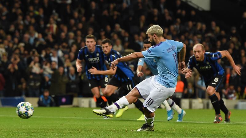 Manchester City striker Sergio Agüero scores their second goal from the penalty spot during the Champions League Group C  match against Atalanta at the Etihad stadium. Photograph: Paul Ellis/AFP via Getty Images