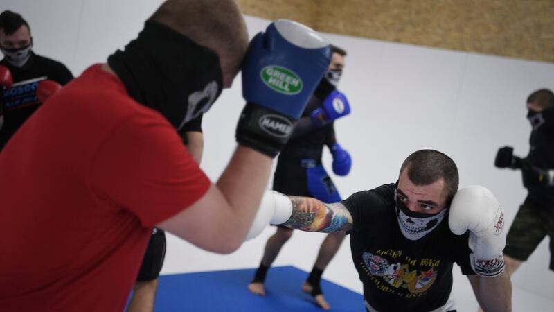 Members of one of Russia’s soccer hooligan groups train at a gym in Moscow. Photograph: James Hill/The New York Times