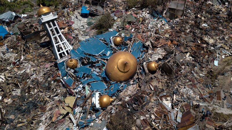 A destroyed mosque and the surrounding area in Palu. Photograph:  EPA/STR