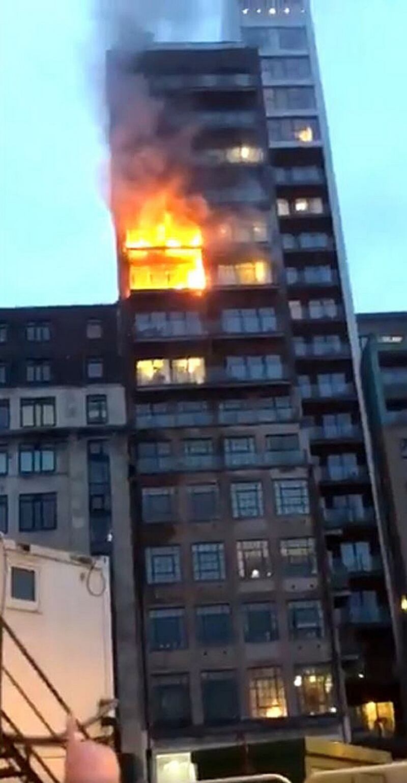 Image taken from video shared by @J_Booth94 of a fire at a 12-storey building in Manchester. Photograph: @J_Booth94/PA Wire