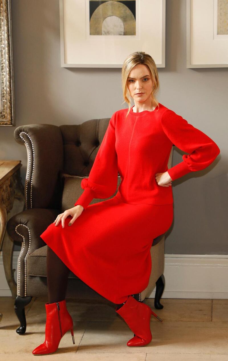 This striking  red ensemble comprises the top at €60 and skirt priced at €82. Photograph: Kieran Harnett